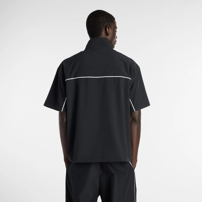 【ネコポス対応可】ニューバランスNEWBALANCEトレーニングシャツトレーニングジャケットメンズウーブンショートスリーブハーフジップMT61713I-BK